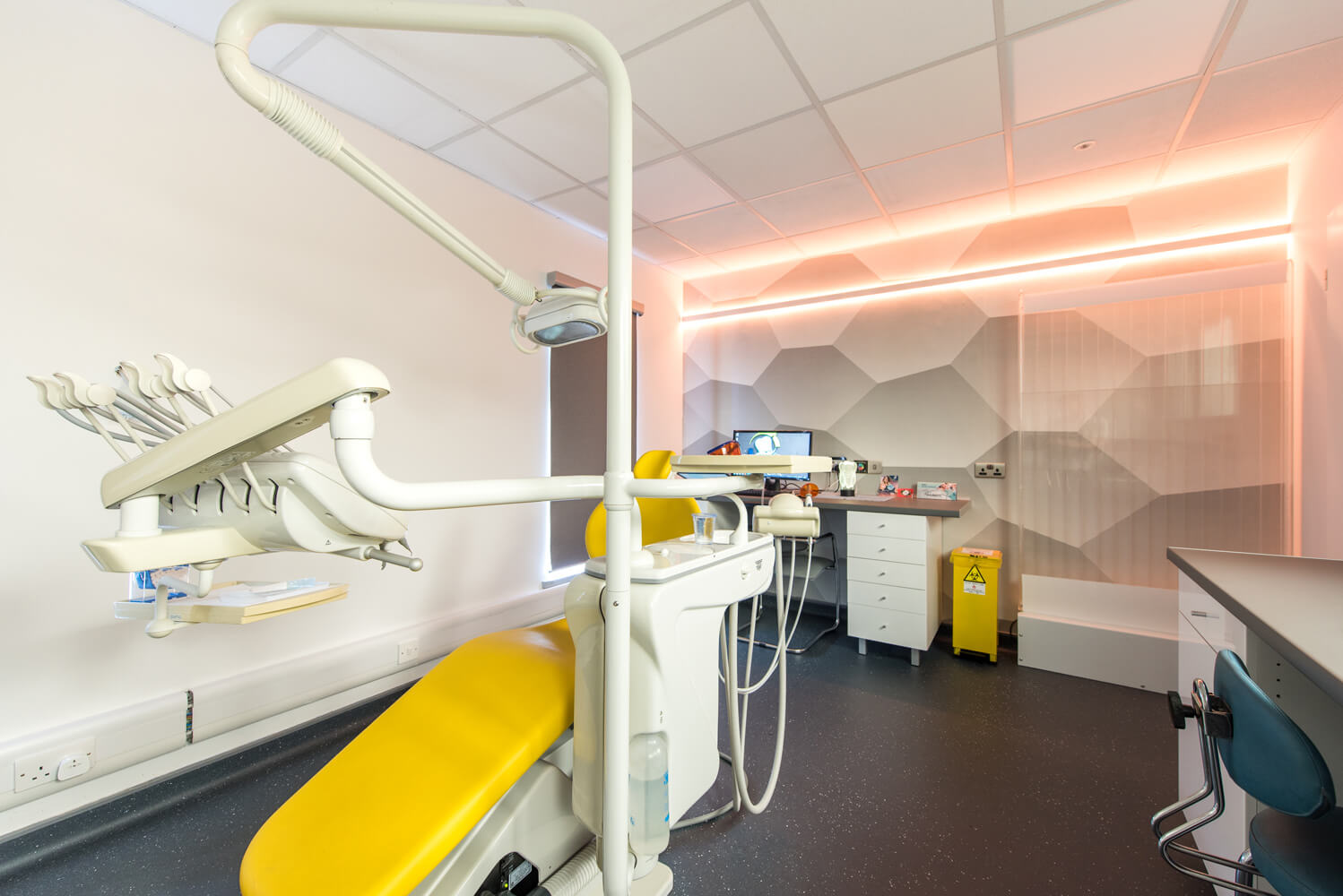 yellow dental office with led lights