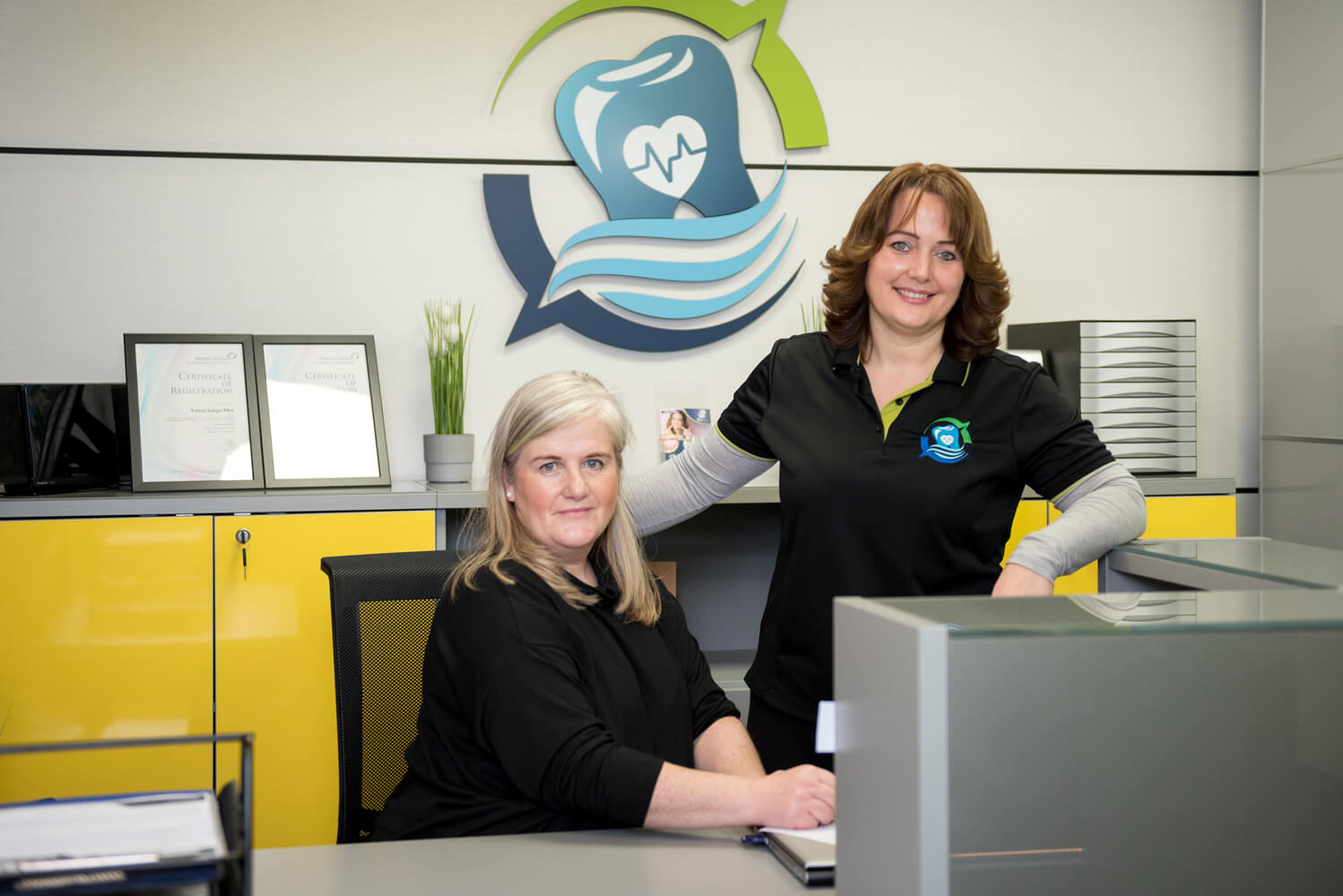 Ann and Beata at the reception desk in Suir Clinic